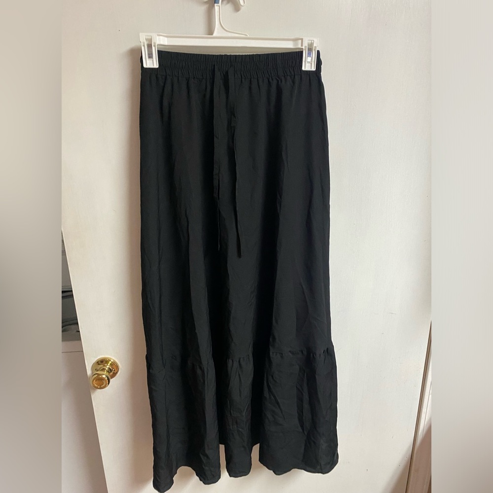 Long black skirt. Size medium. Breathable. Brand new